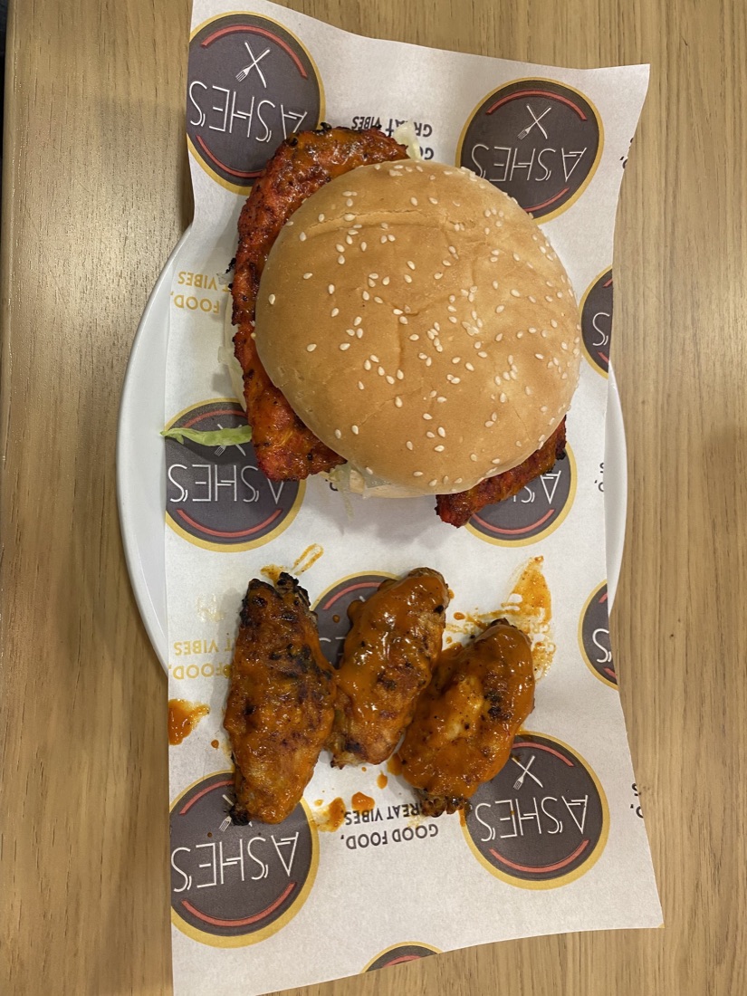 Chicken burger and flaming wings on Ashes wrapper